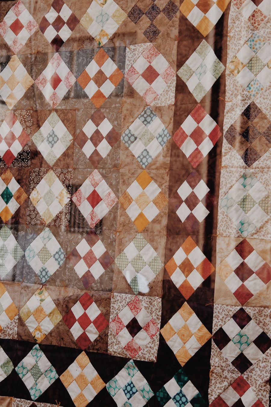 布団の側生地。乾燥機では落ちない汗や皮脂の汚れが残る部分